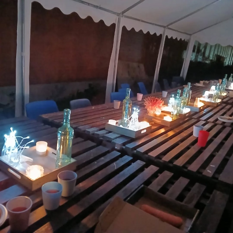 click to see larger image bonfire event in the community garden