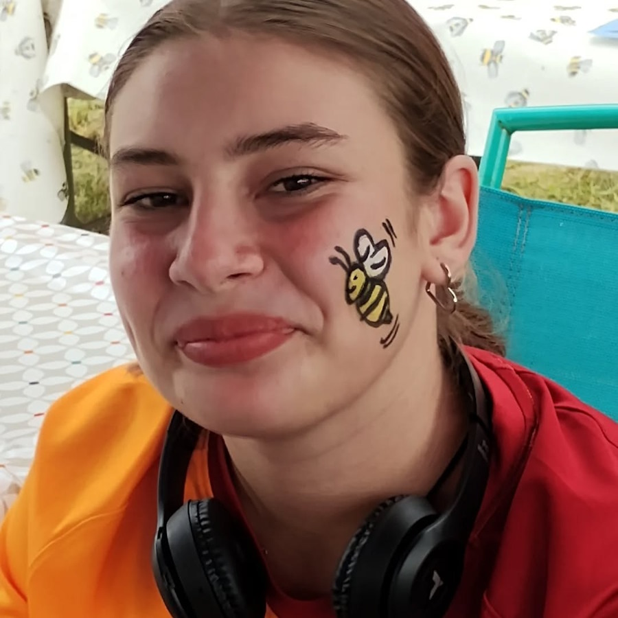 click to see larger image face painting in the community garden