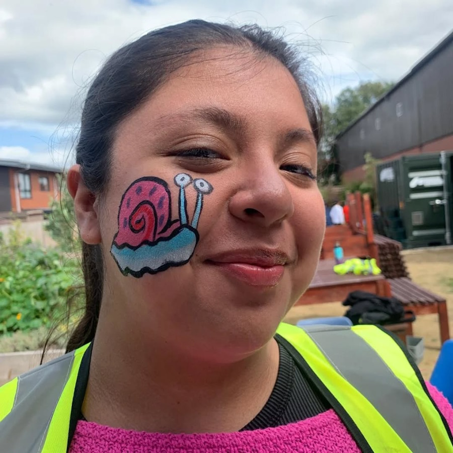 click to see larger image face painting in the community garden